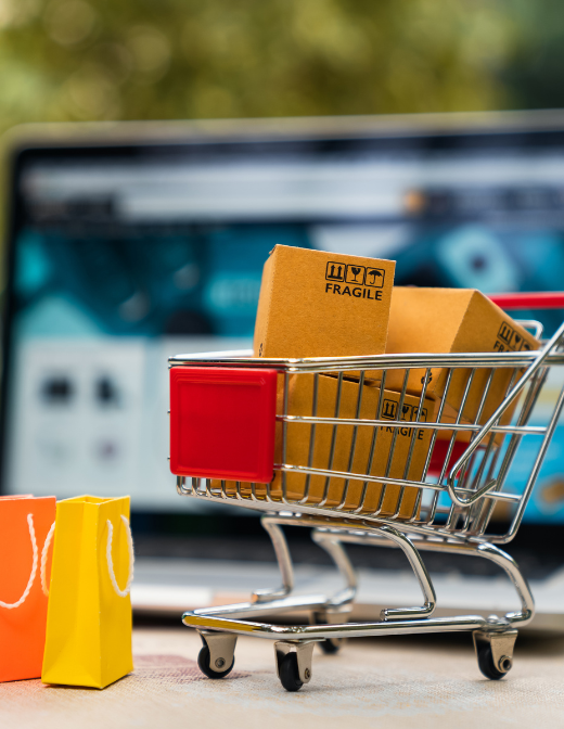 online shopping concept with mini cart and packages